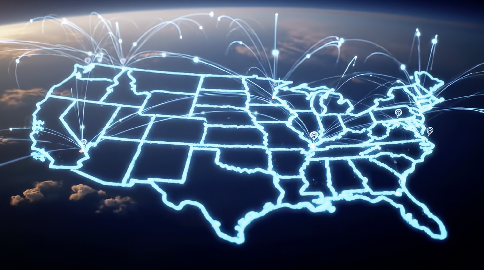 Glowing US Map A glowing map of the USA with points of light arching from different cities to show connections.